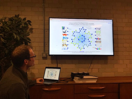 Chris demonstrating his 12 Days of Christmas machine learning tool